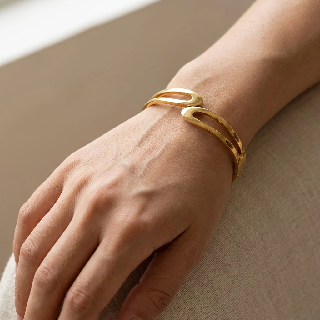 The “Lyra” Sculptural Infinity Cutout Bangle