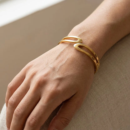 The “Lyra” Sculptural Infinity Cutout Bangle