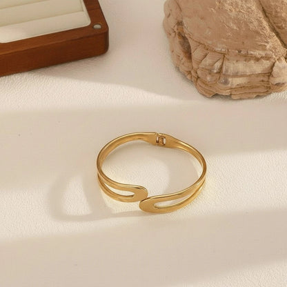 The “Lyra” Sculptural Infinity Cutout Bangle