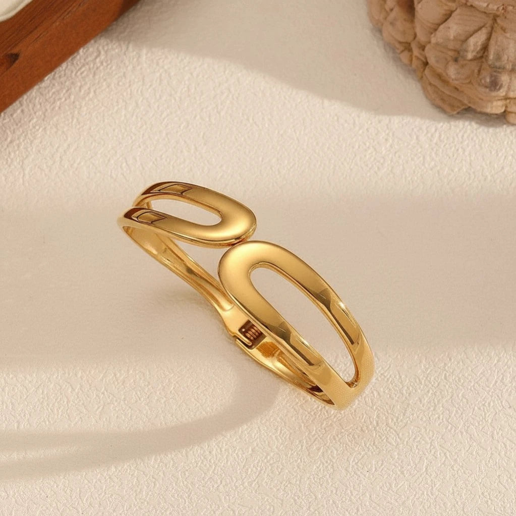The “Lyra” Sculptural Infinity Cutout Bangle