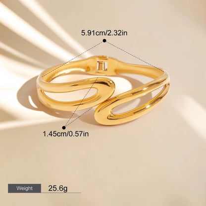 The “Lyra” Sculptural Infinity Cutout Bangle
