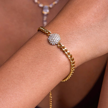 The Orbit Gold Pavé Crystal Ball Chain Bracelet — on marble platform showing full bracelet with pavé crystal ball charm and lobster clasp
