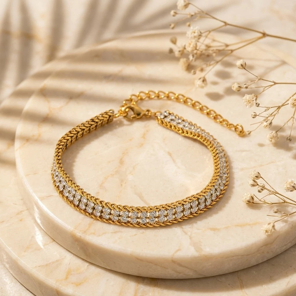 The Armour Gold Crystal-Framed Wide Band Bracelet — spec flat lay on gold surface showing dimensions: weight 6.0g, length 15.0+6.0cm, width 0.61cm
