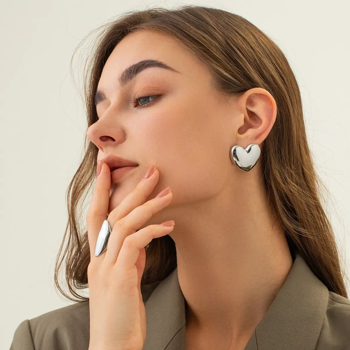 The Sculptural Puffed Heart Statement Stud Earrings