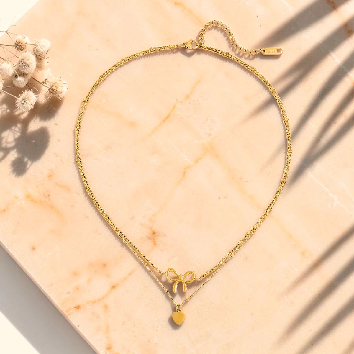 The Amor Layered Bow & Heart Pendant Necklace Set