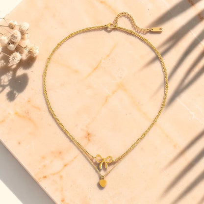 The Amor Layered Bow & Heart Pendant Necklace Set