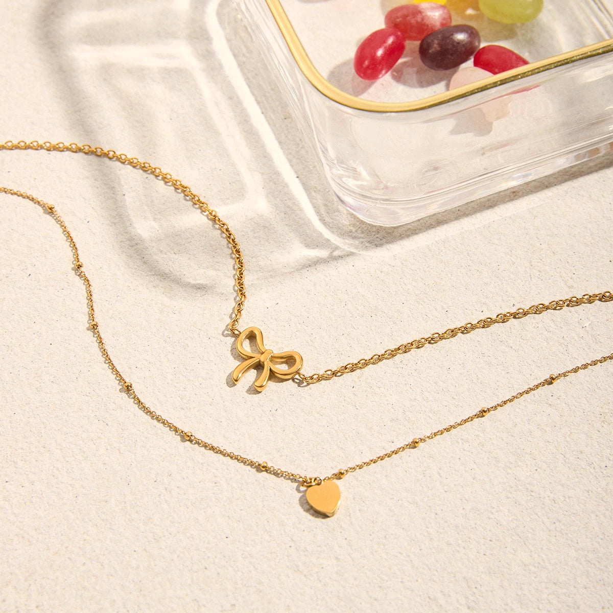 The Amor Layered Bow & Heart Pendant Necklace Set