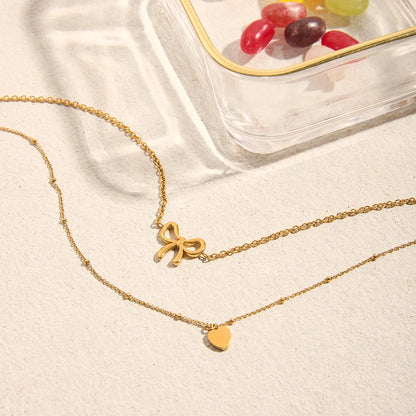 The Amor Layered Bow & Heart Pendant Necklace Set