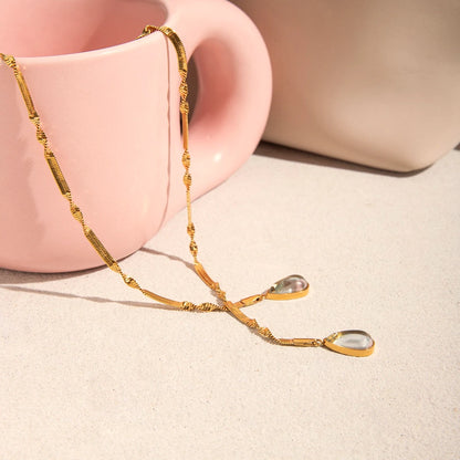 The Atelier Twisted Herringbone Teardrop Lariat Necklace